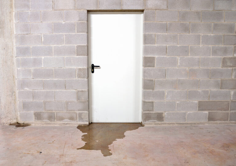 white-door-with-water-leaking-out