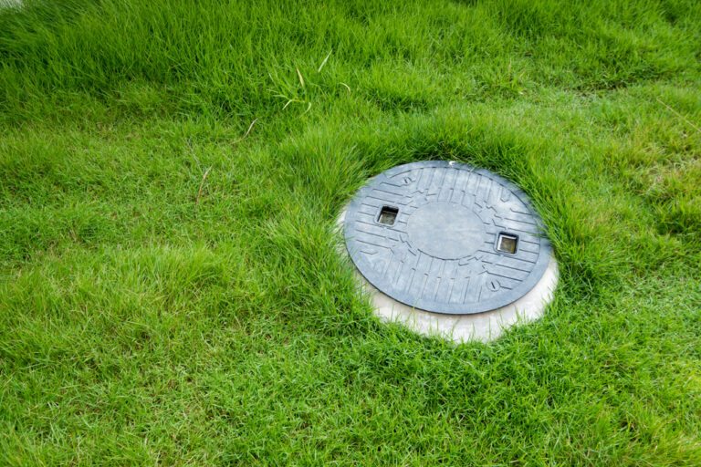 sewer-in-grassy-field