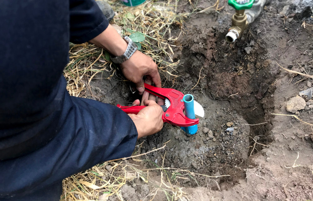 Plumber worker install and repair the pipe