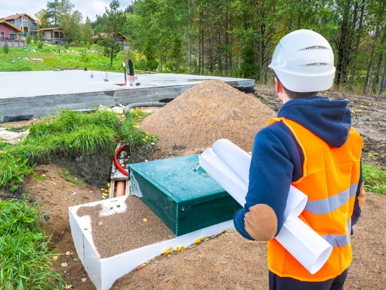 Builder is looking at a septic tank