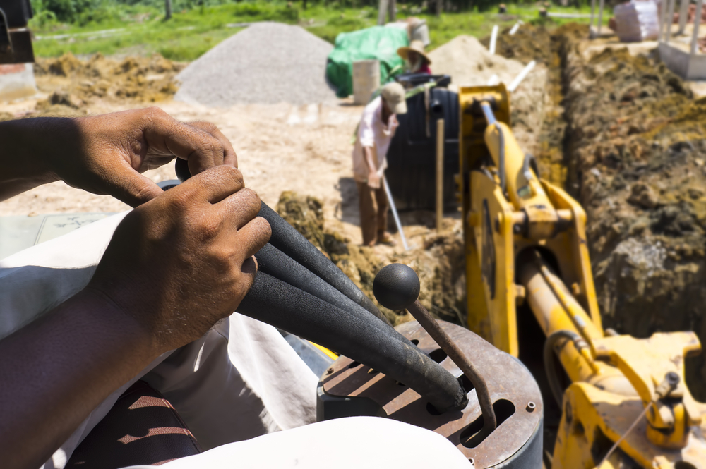 Digging hole for septic tank installation