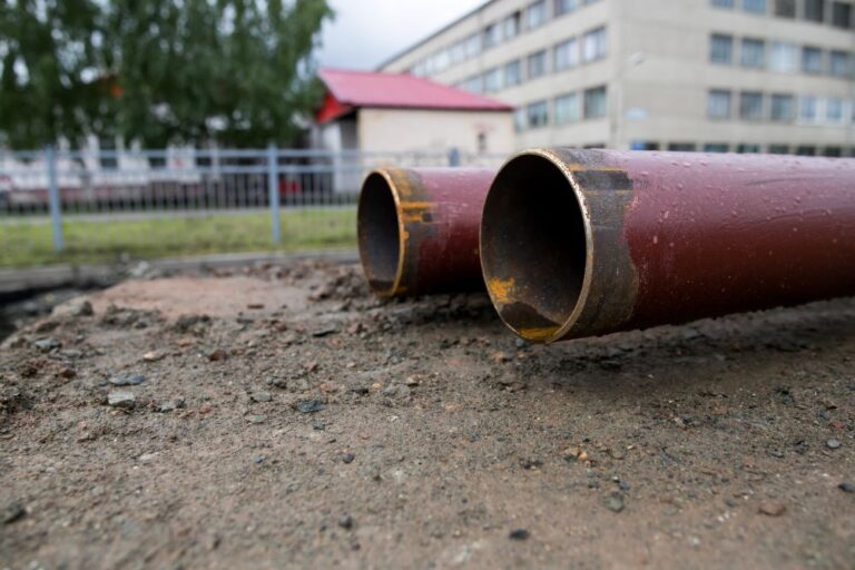 old pipes stacked outside