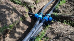 Underground water supply pipes connected in a trench installation
