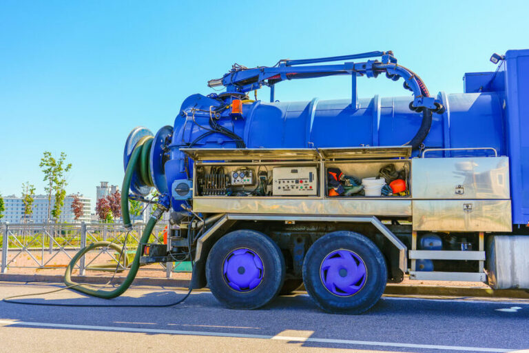 Steam truck with hoses and high-pressure equipment for plumbing work in Edmonton
